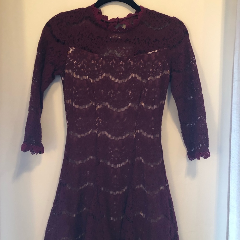 Really pretty lacy Francesca’s dress.